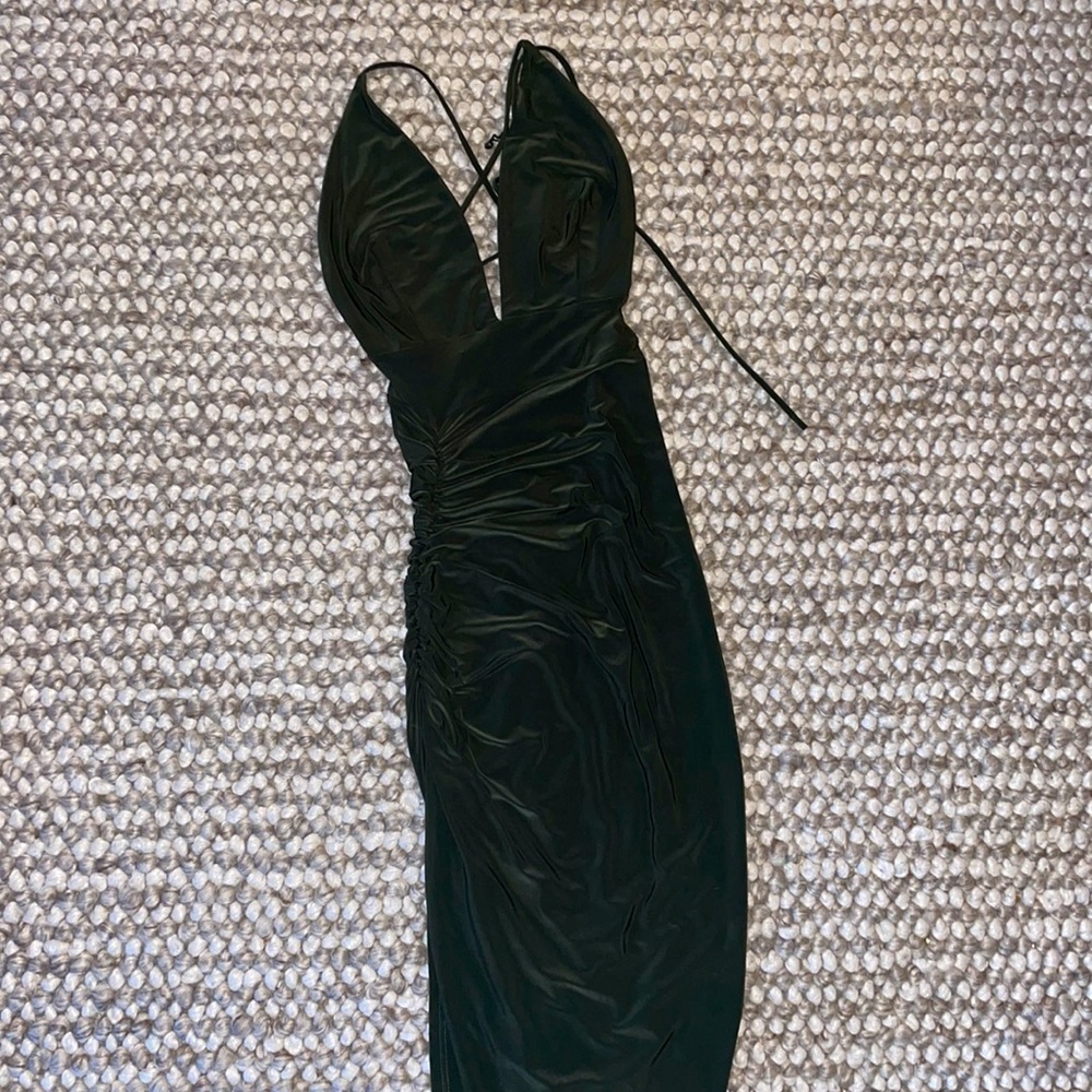 Olive green dress. Long a little above the ankles with a slit on the side